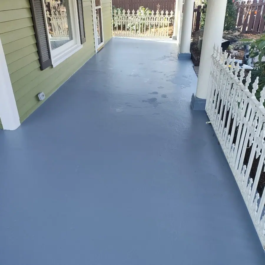 The same porch floor washed, scraped and primed in blue gray